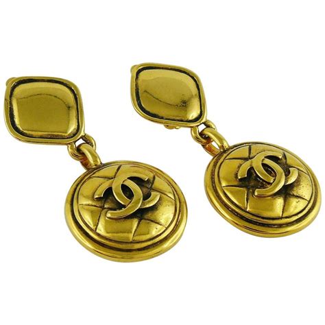 vintage chanel dangle earrings|chanel quilted style dangle earrings.